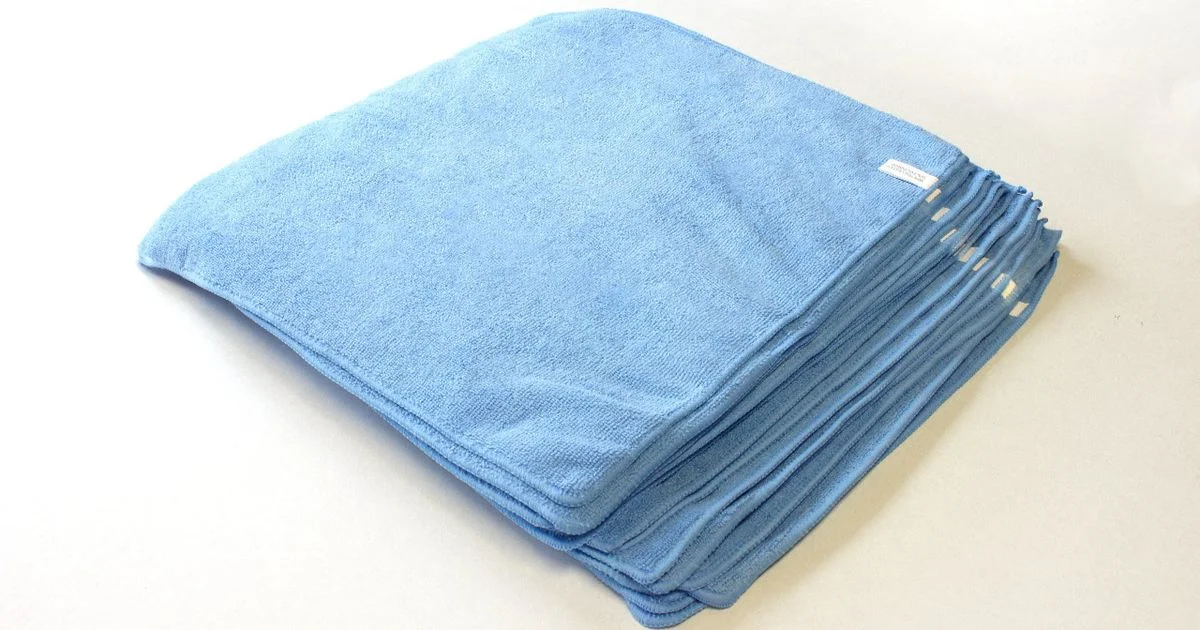 Stack of blue microfiber cleaning cloths